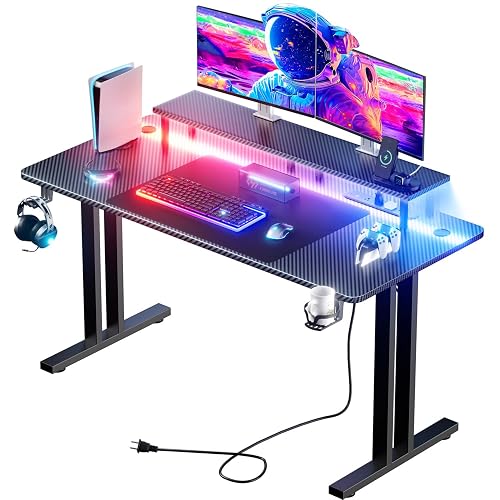HLDIRECT 47 Inch Gaming Desk with LED Lights & Cable Management, Black | Ergonomic carbon fiber gaming computer desk with 5 sockets, monitor stand, cup holder, headphone hook & mouse pad for gamers
